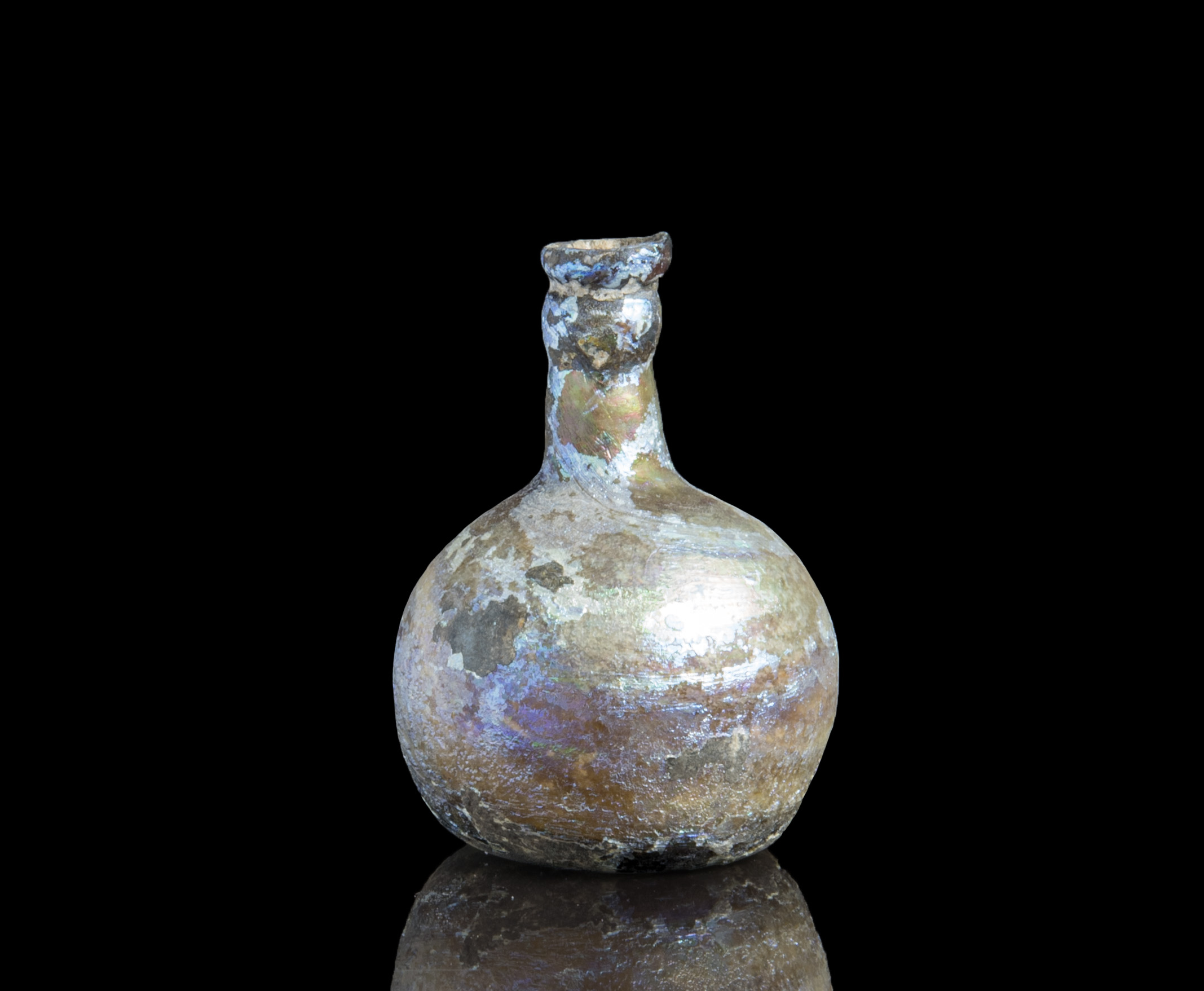 Ancient Roman glass cosmetics flask with pretty iridescence Antiquities